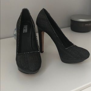 Black jean style DIESEL pumps.